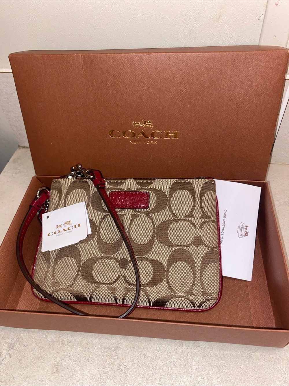 Coach Signature Canvas Wristlet in Khaki and Burgundy Trim